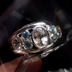 White Zircon Round By Blue Zircon Ring